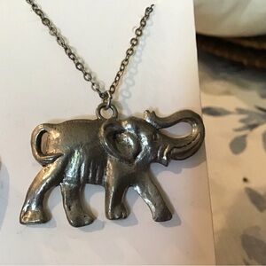 19” long silver elephant necklace.  Back same as front. Nice solid weigh…